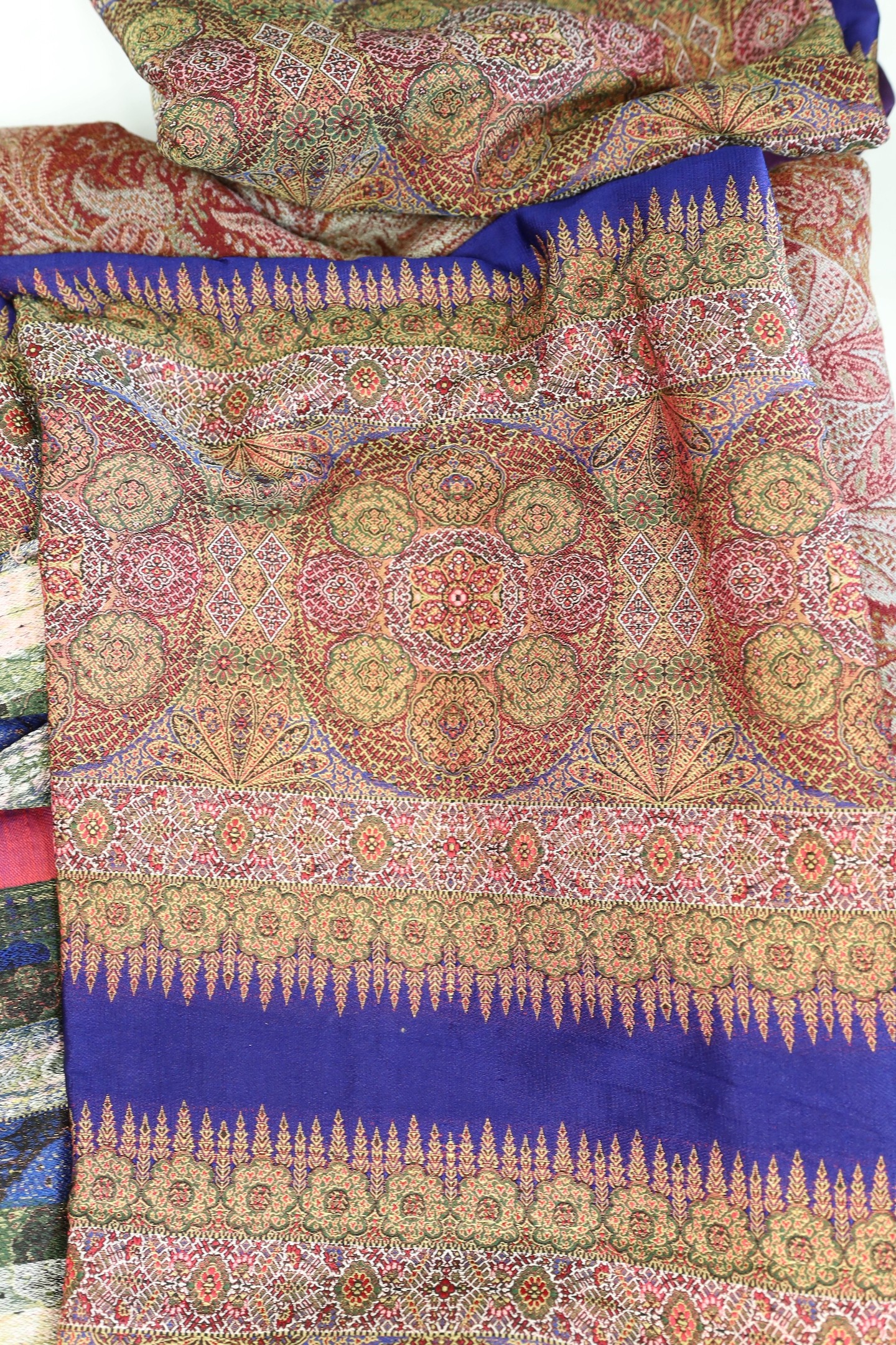 Large19th century paisley shawl and similar silk paisley shawl, cut into panels.